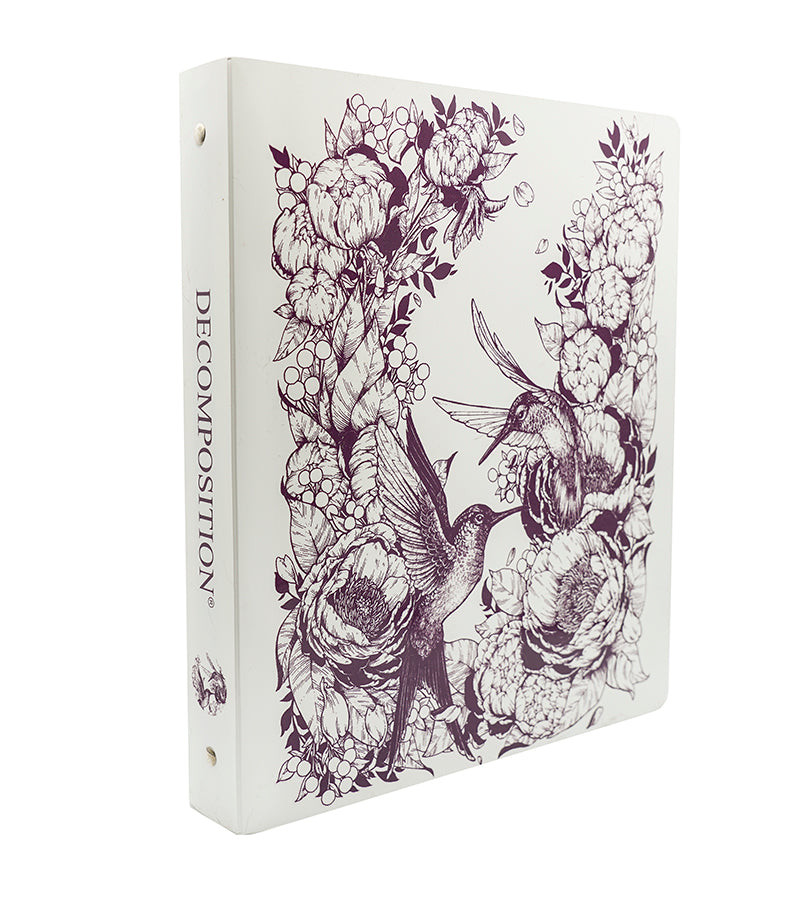 White plastic binder printed with hummingbirds and flowers