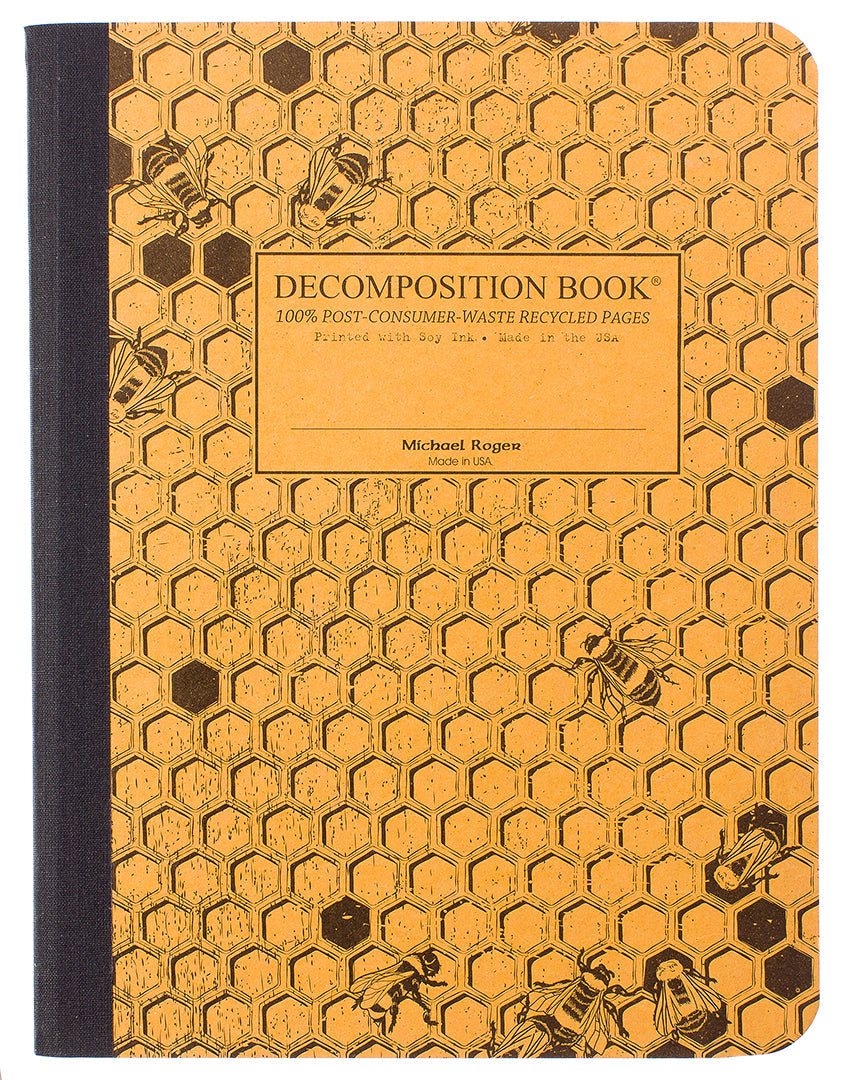 Composition notebook printed with a honeycomb pattern and bees