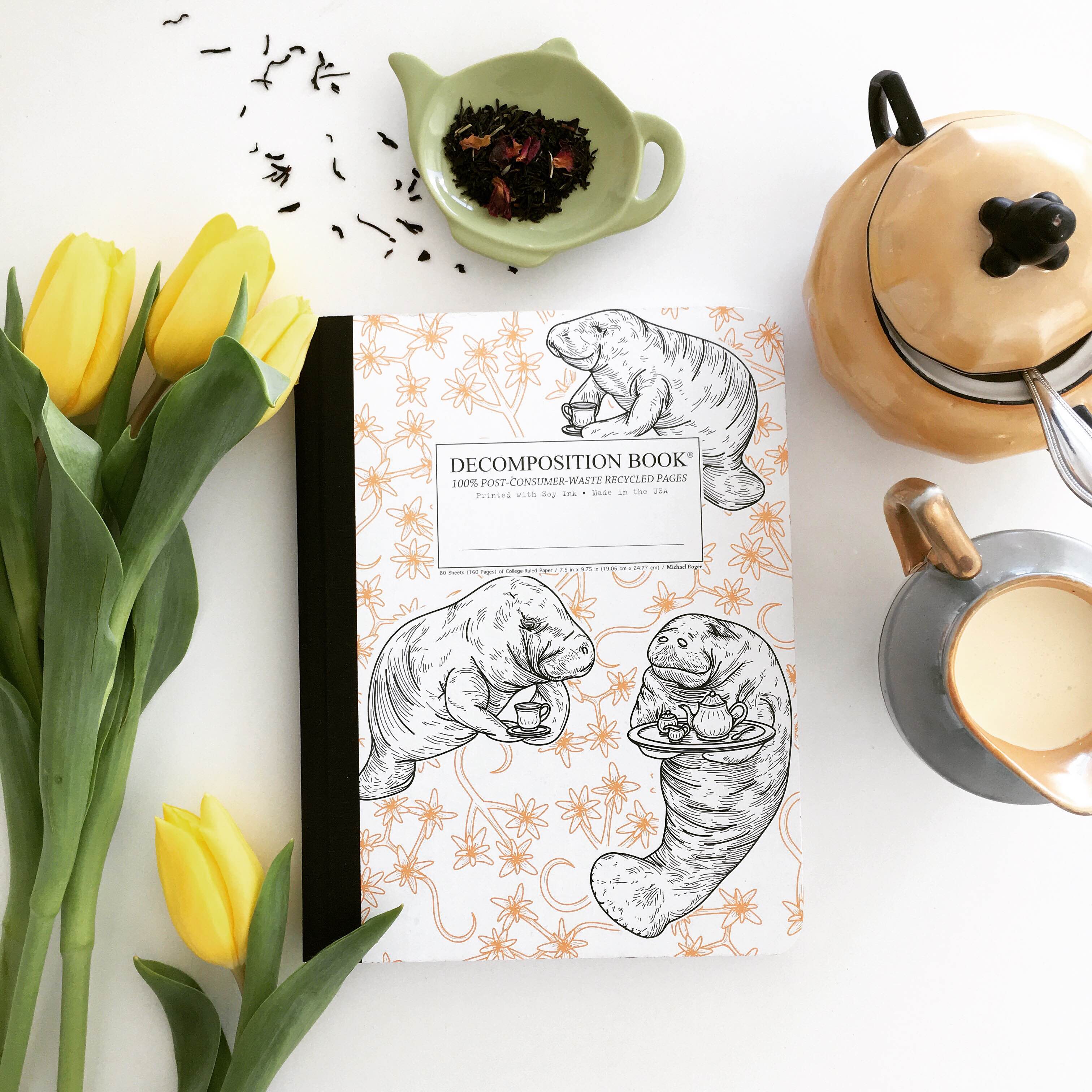 Composition notebook printed with manatees drinking tea