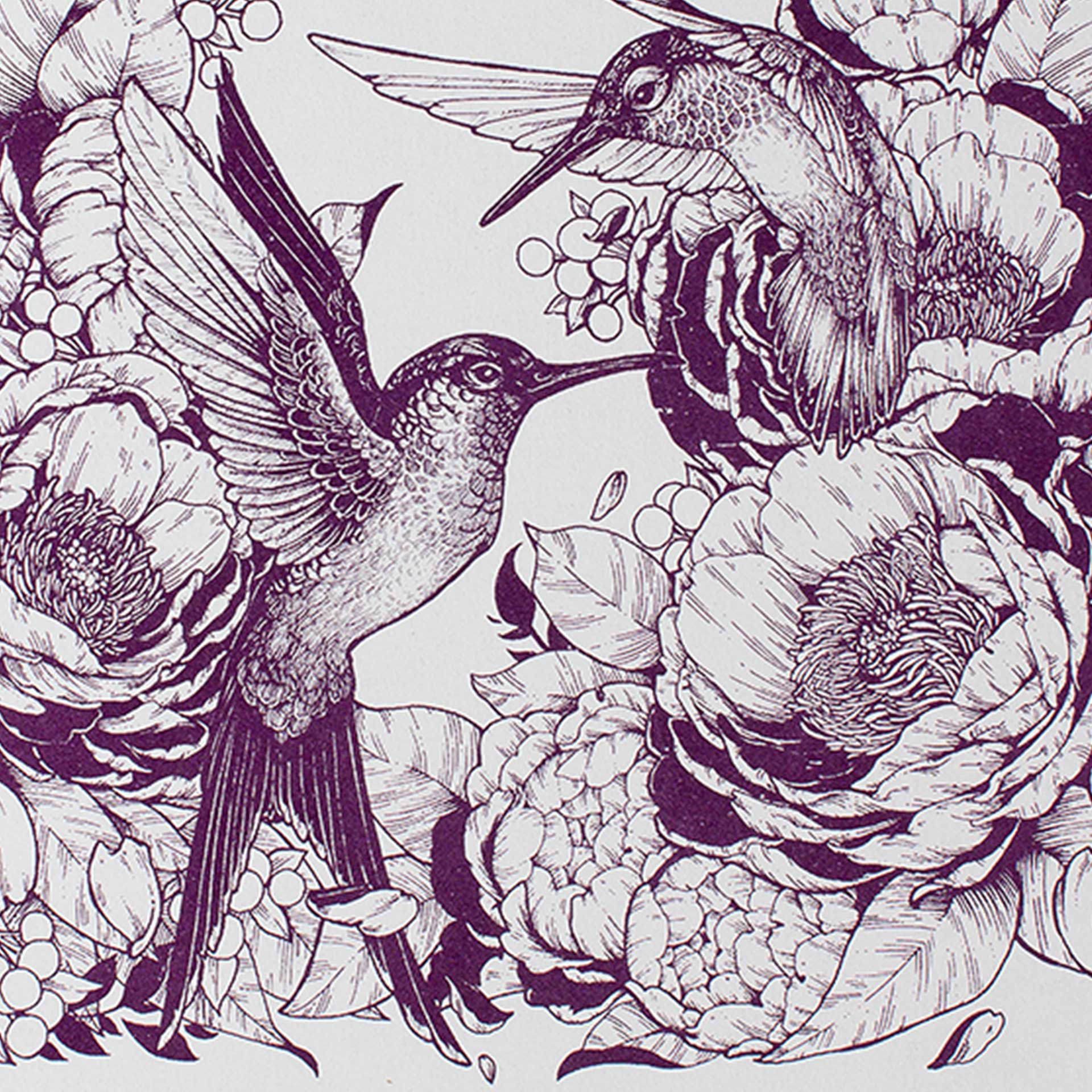 Closeup of printed hummingbirds and flowers