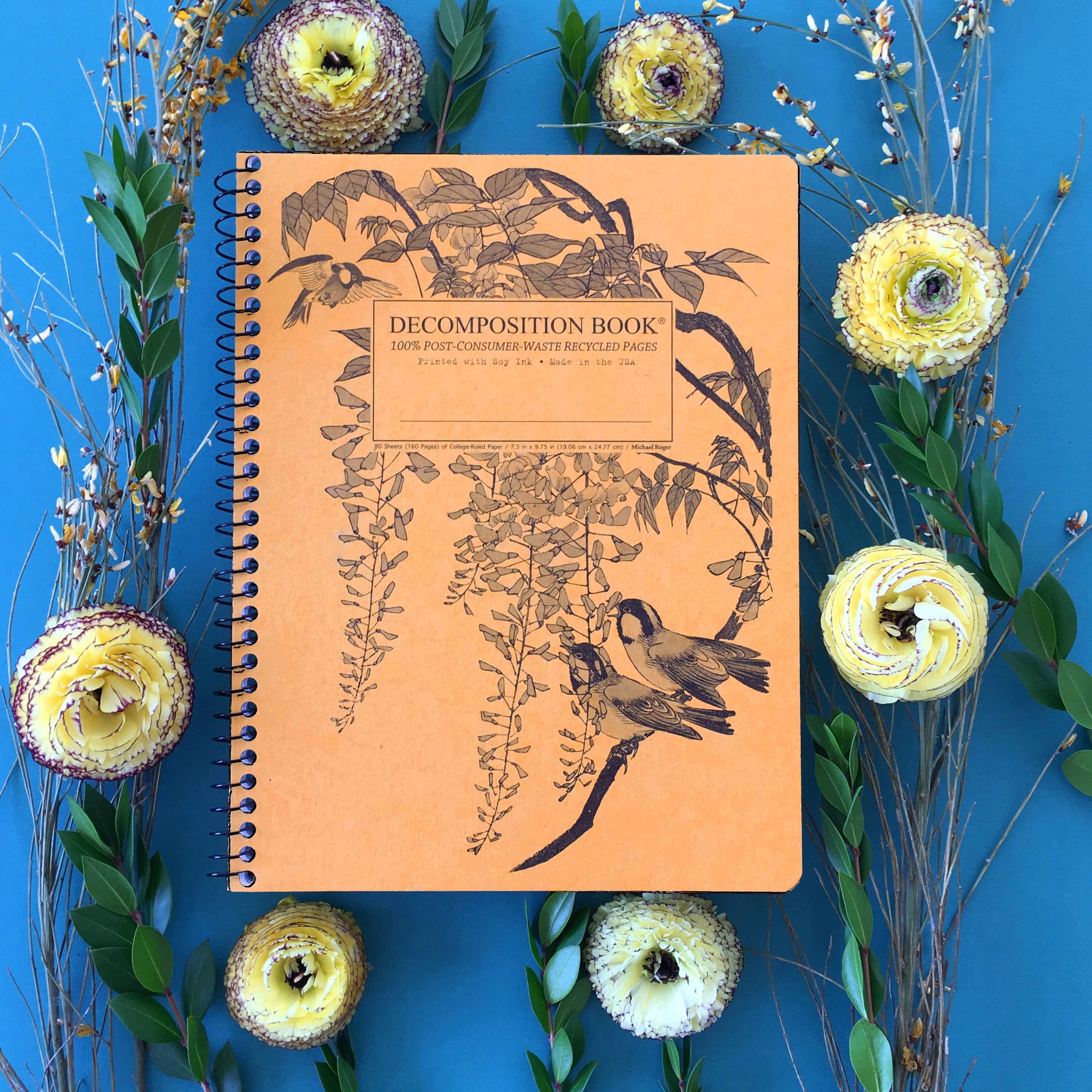 Spiral notebook printed with small birds on a branch