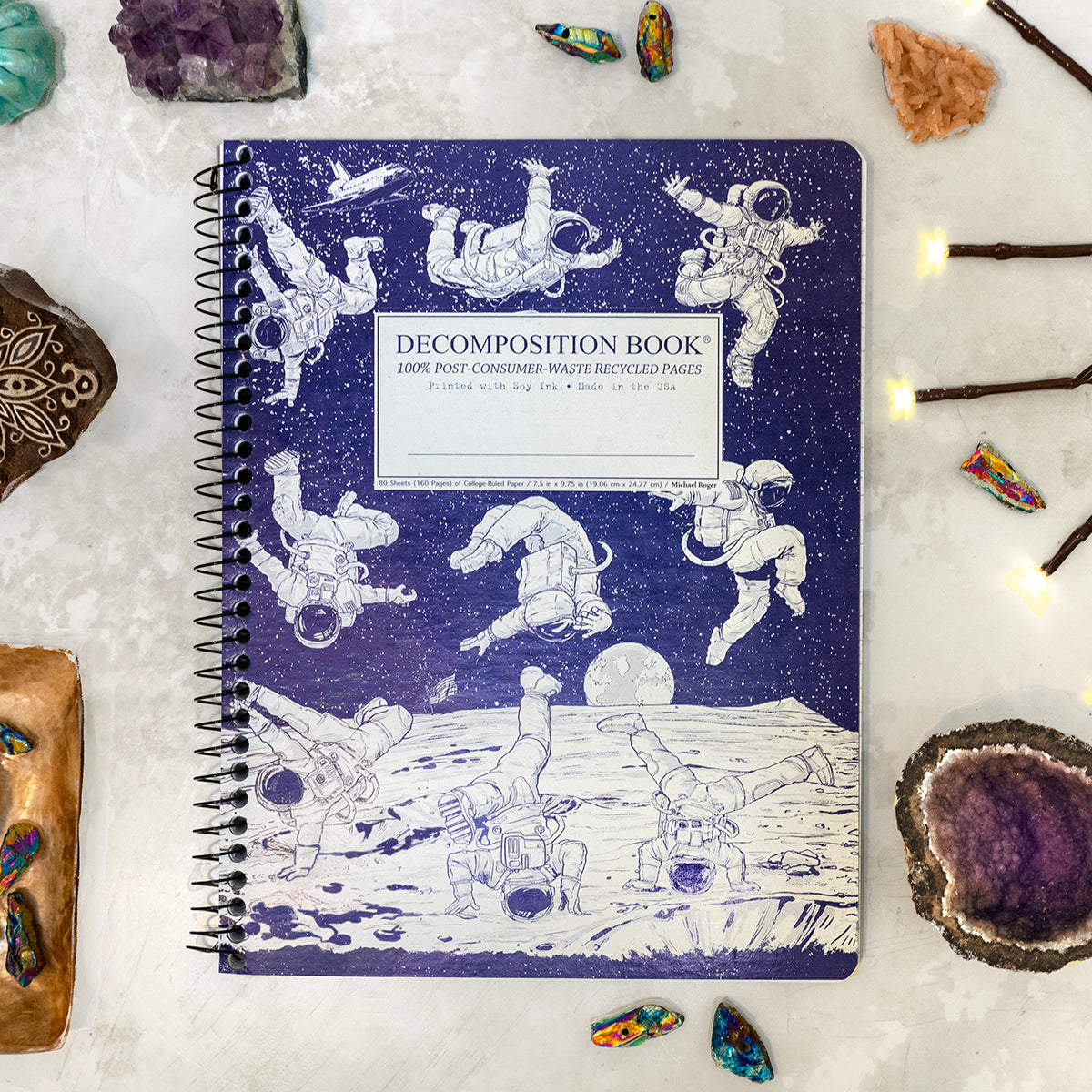 Spiral notebook printed with breakdancing astronauts on the moon