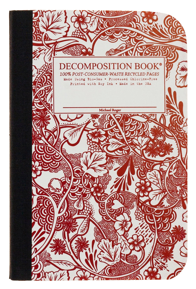 Composition notebook printed with abstract vines and flowers in red