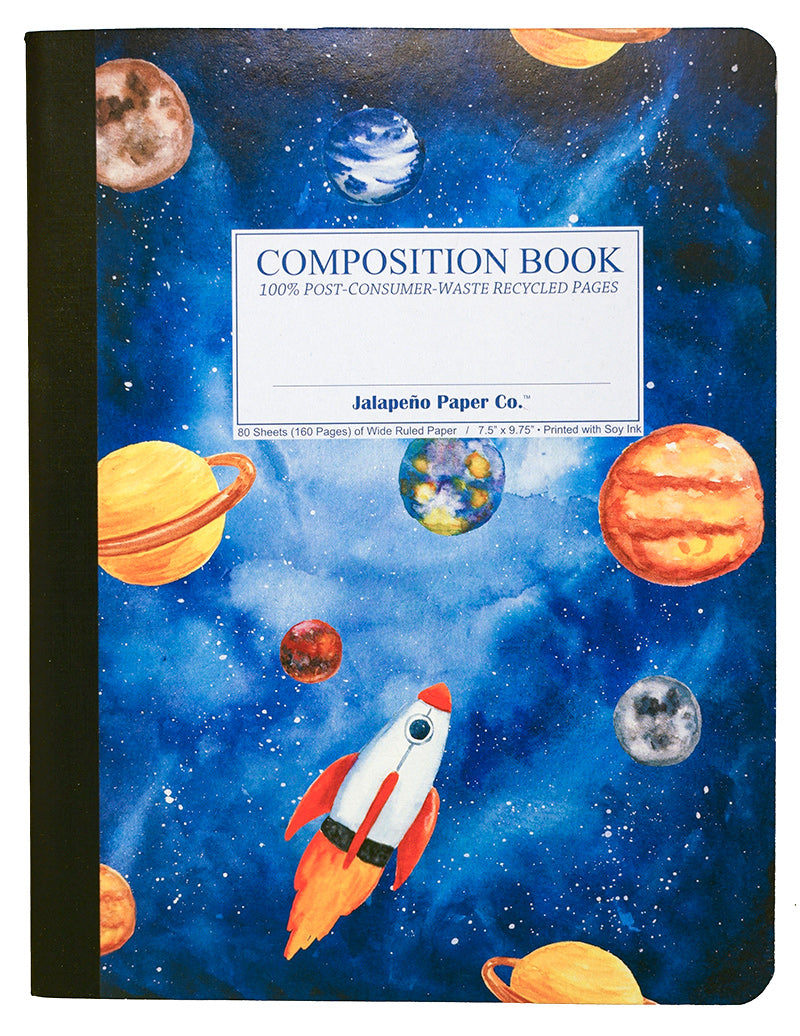 Composition notebook printed with a spaceship rocketing among planets