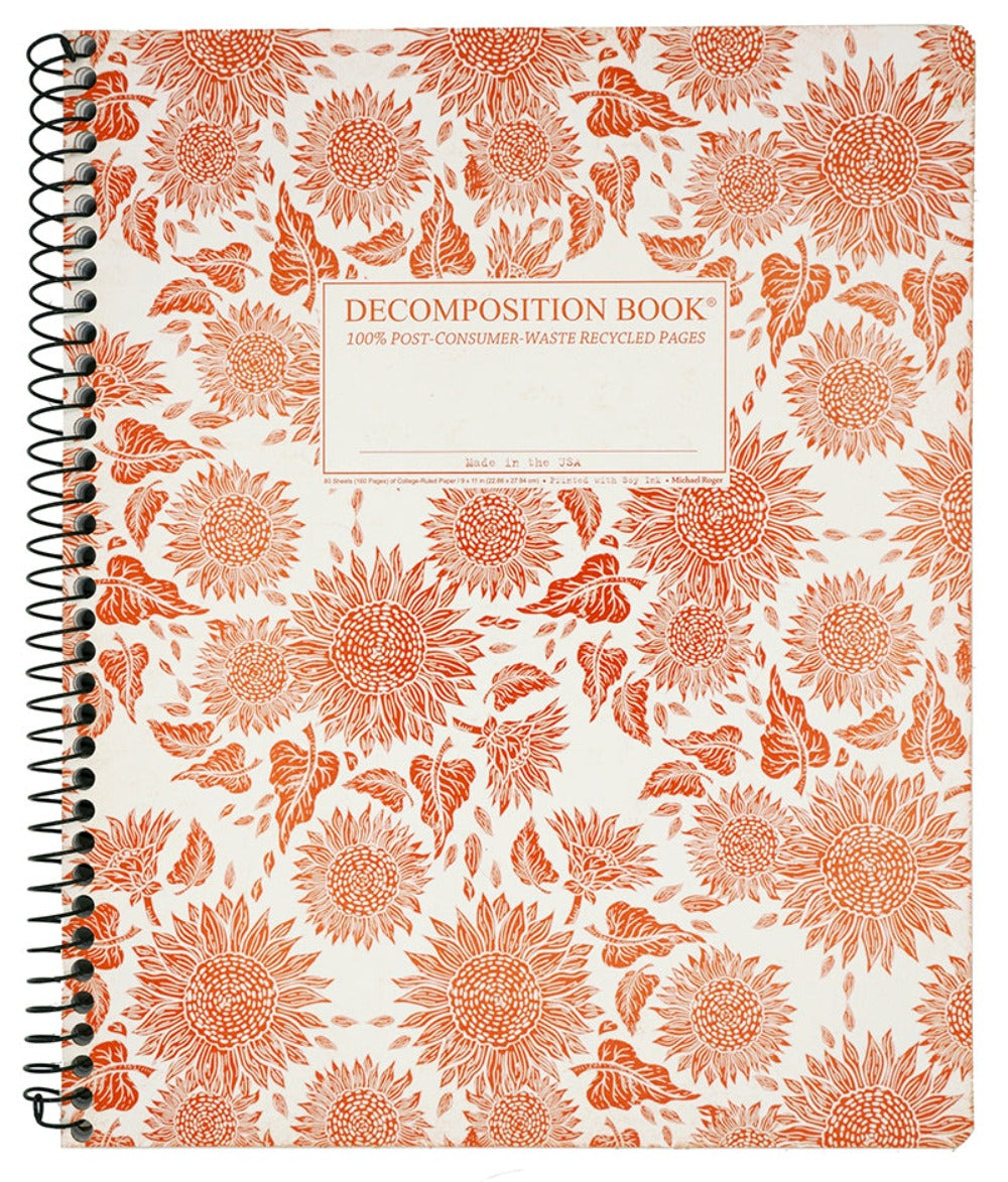 Spiral notebook printed with a bright orange sunflower pattern