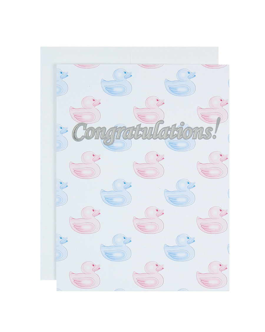 Greeting card printed with the word Congratulations! and pink and blue duckies