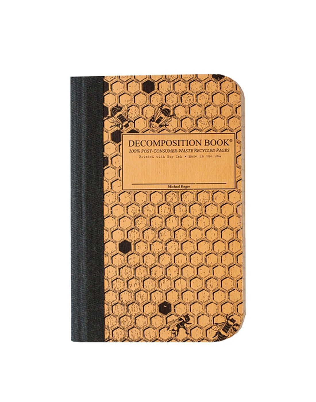 Composition notebook printed with a honeycomb pattern and bees