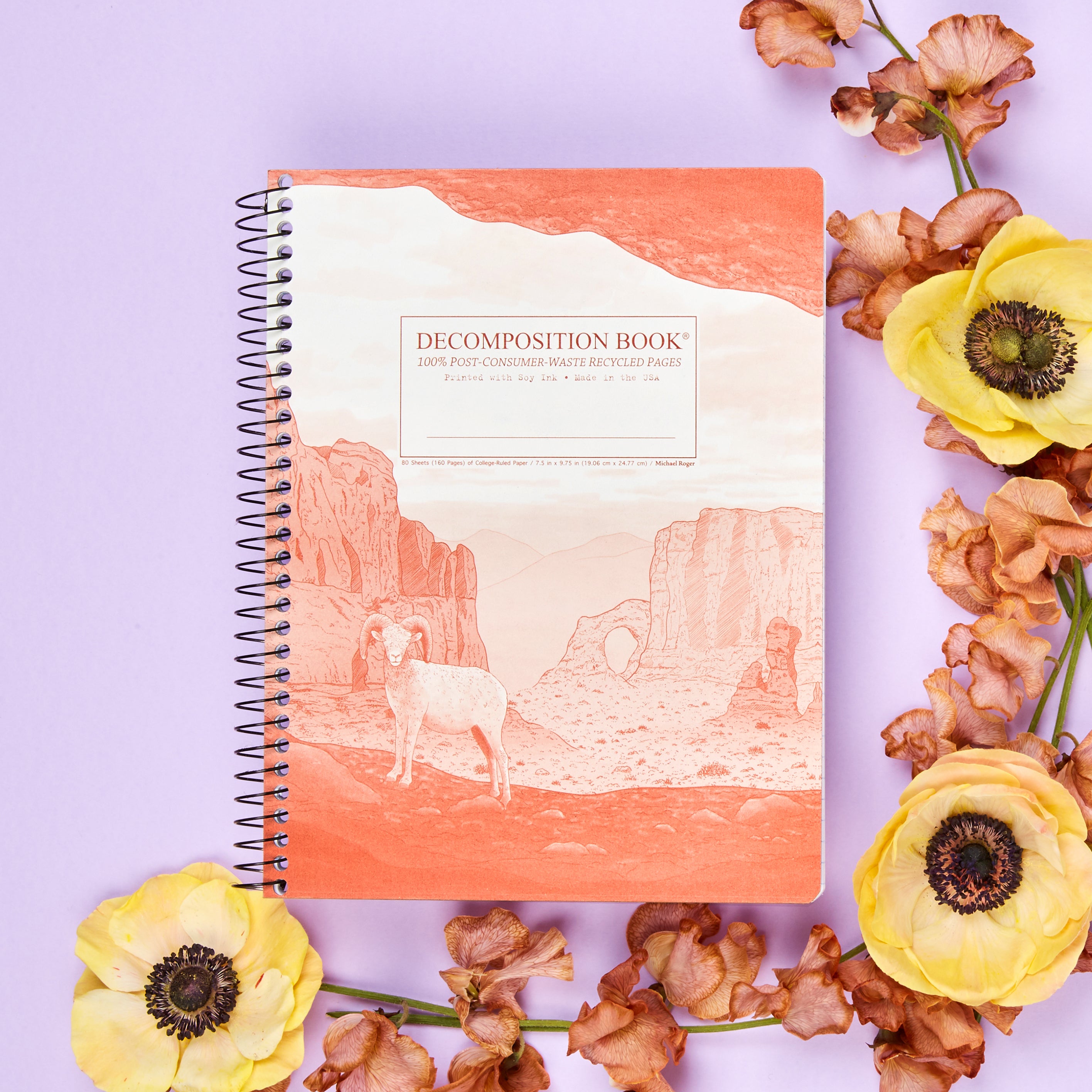 Spiral notebook printed with a desert landscape in orange