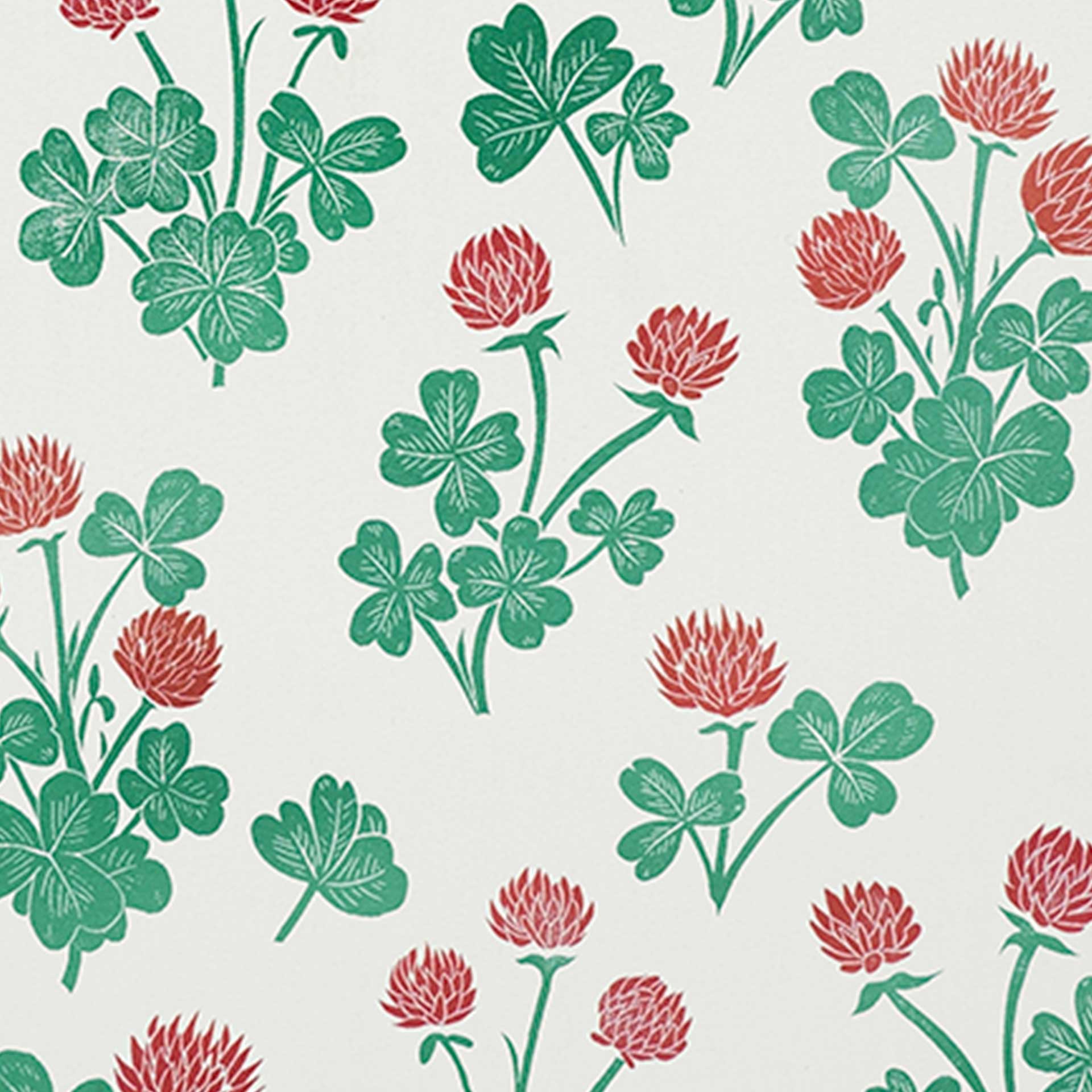 Closeup of a pattern of red and green flowers