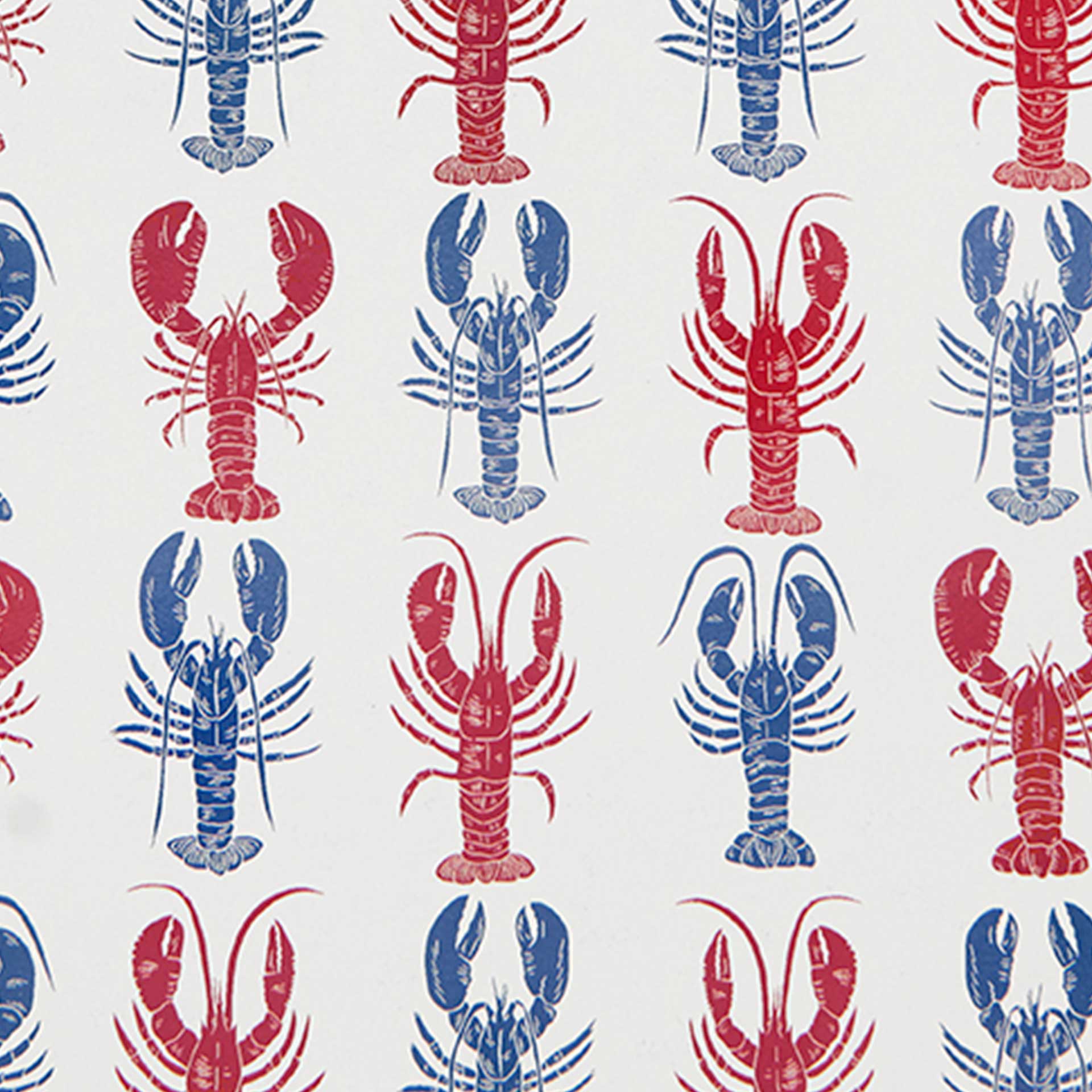 Closeup of a printed pattern of red and blue lobsters