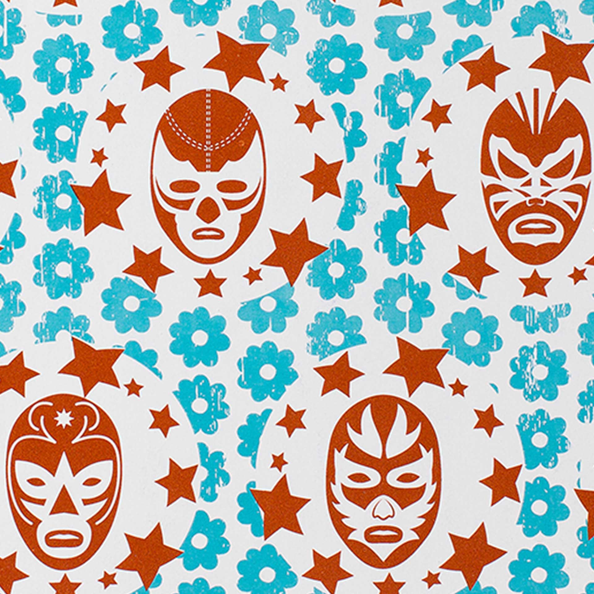 Closeup of Mexican luchador masks in red and blue
