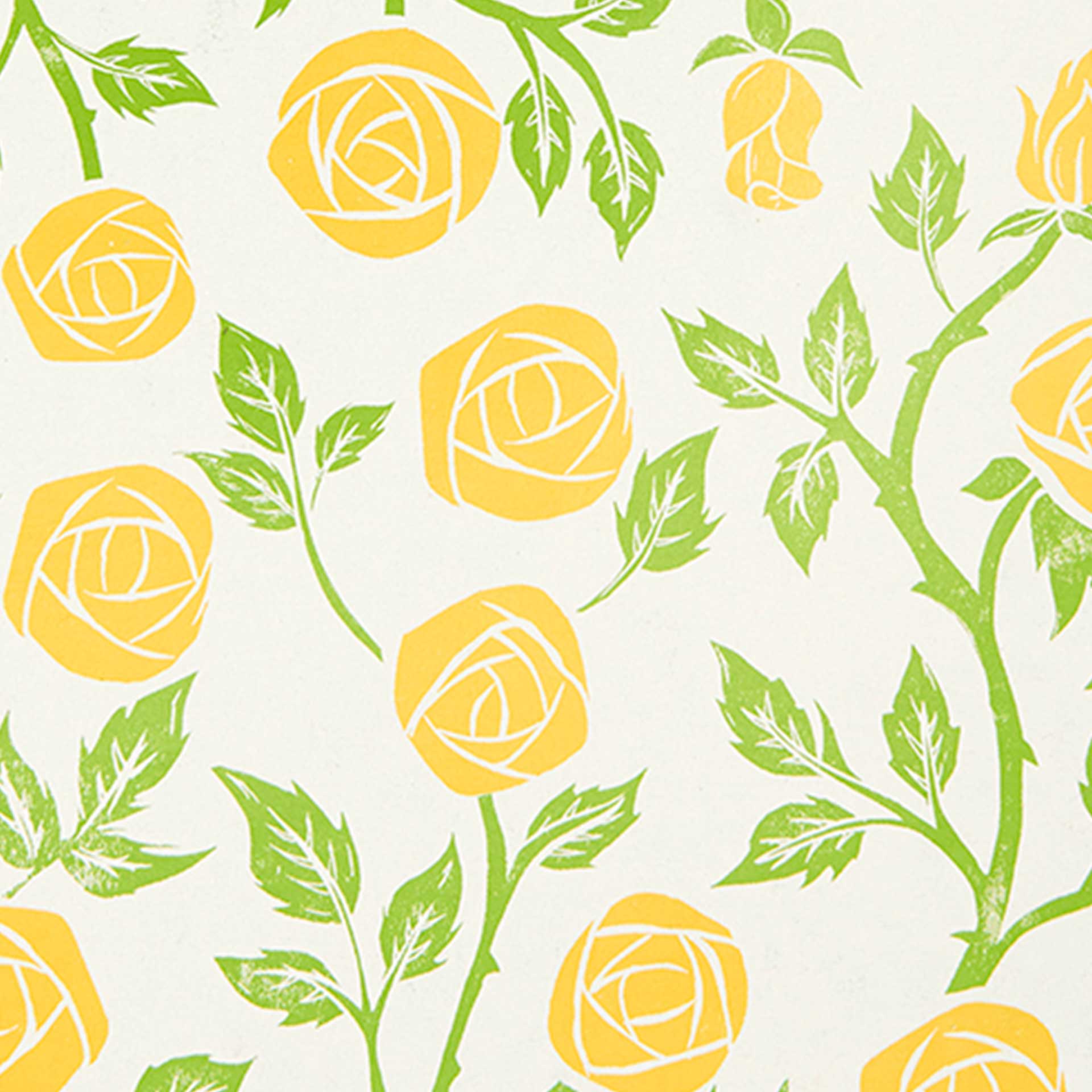 Closeup of printed yellow roses and green vines