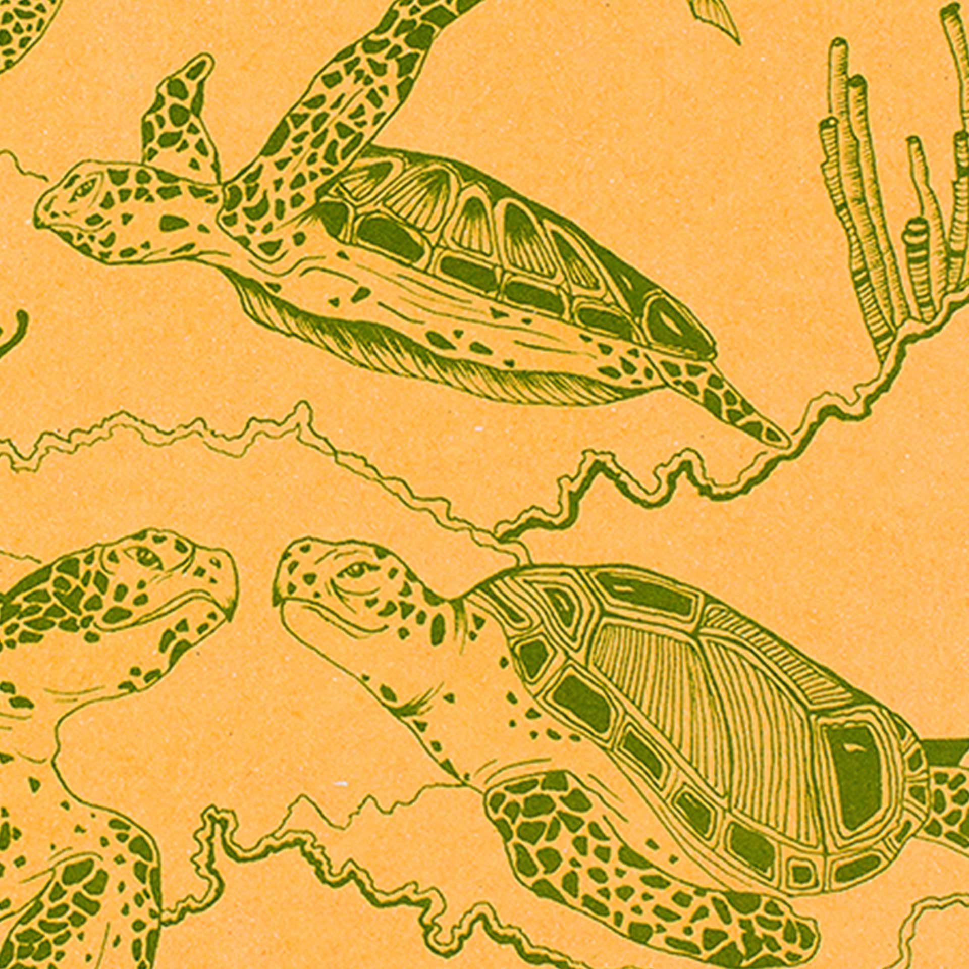 Closeup of printed with green turtles on yellow