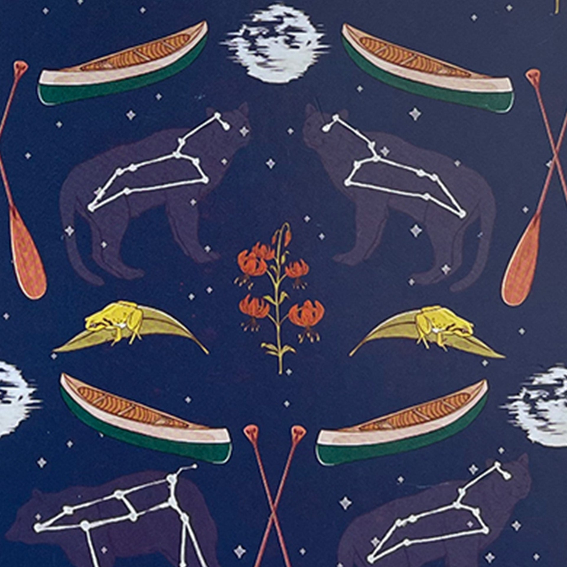 Closeup of canoes and constellations printed on blue