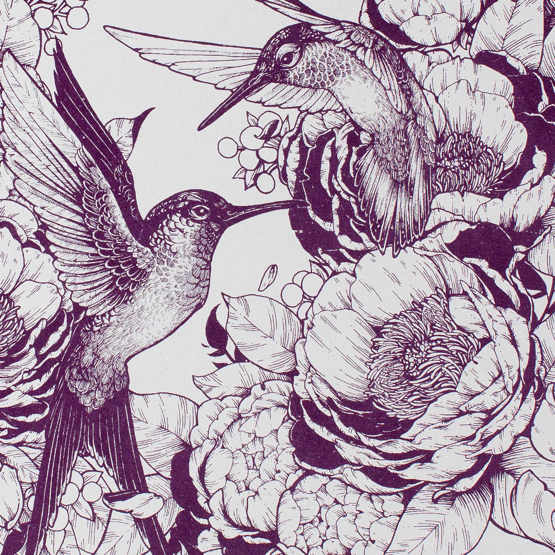 Closeup of printed hummingbirds and flowers